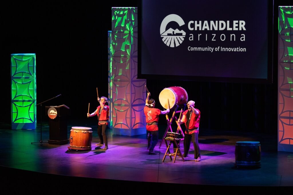 performers on stage playing musical instruments